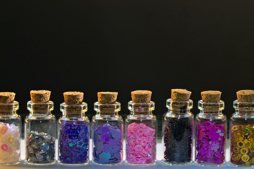 sequins, craft materials, arts and crafts, art supplies, background, vial, cork, close up, free space for text